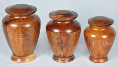 WOODEN URN
ITEM NO. 7142
DESCRIPTION:-  WOODEN RELIGIOUS URN
SIZE:- 21X14 CM, 19X13 CM, 16X12CMS.
CAPACITY:- 1.500 ML, 1.00 ML, .500 ML.
FINISH:-  NATURE WOOD FINISH.
PRICE:-
PACKING:- SINGLE BOX STYRO FOAM UNDER 8 PCS MASTER CARTON

Keywords: RELIGIOUS URN